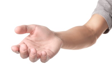 Photo of Offering help. Man reaching his hand on white background, closeup