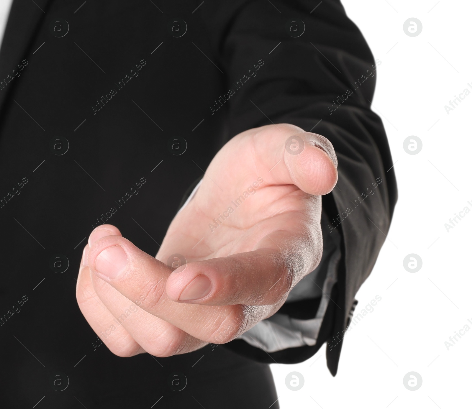 Photo of Offering help. Man reaching his hand on white background, closeup