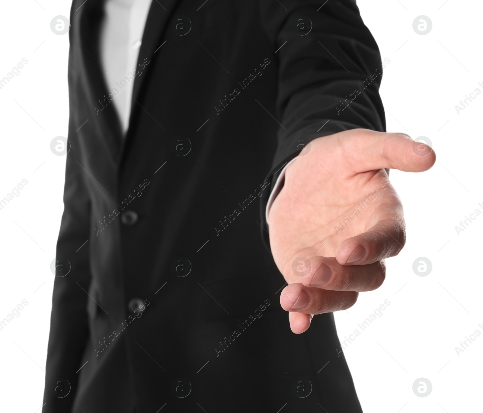 Photo of Offering help. Man reaching his hand on white background, closeup