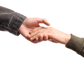 Photo of Help and support. People holding hands on white background, closeup