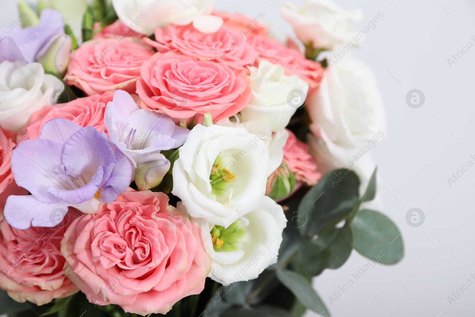 Photo of Beautiful wedding bouquet on light background, closeup