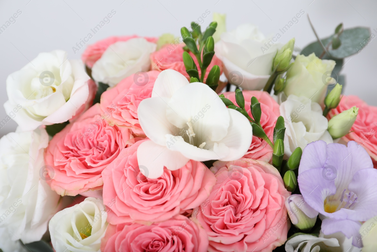 Photo of Beautiful wedding bouquet on light background, closeup