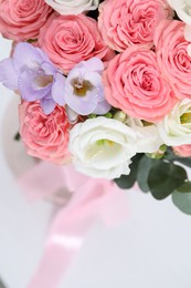 Photo of Beautiful wedding bouquet on light background, closeup. Space for text