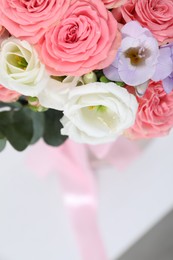 Photo of Beautiful wedding bouquet on light background, closeup. Space for text