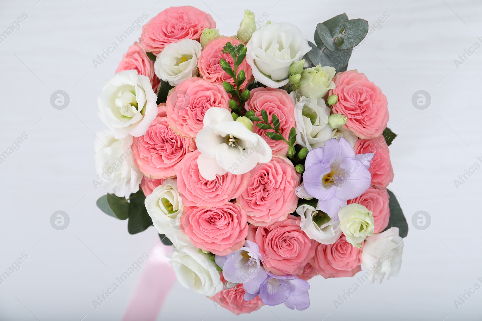 Photo of Beautiful wedding bouquet on light background, closeup