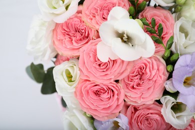 Photo of Beautiful wedding bouquet on light background, closeup