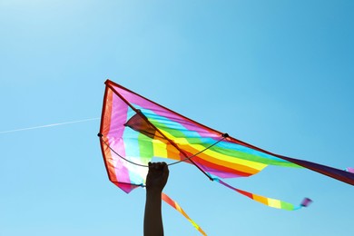 Photo of Boy with kite on sunny day, closeup