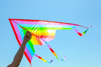 Photo of Man with kite on sunny day, closeup