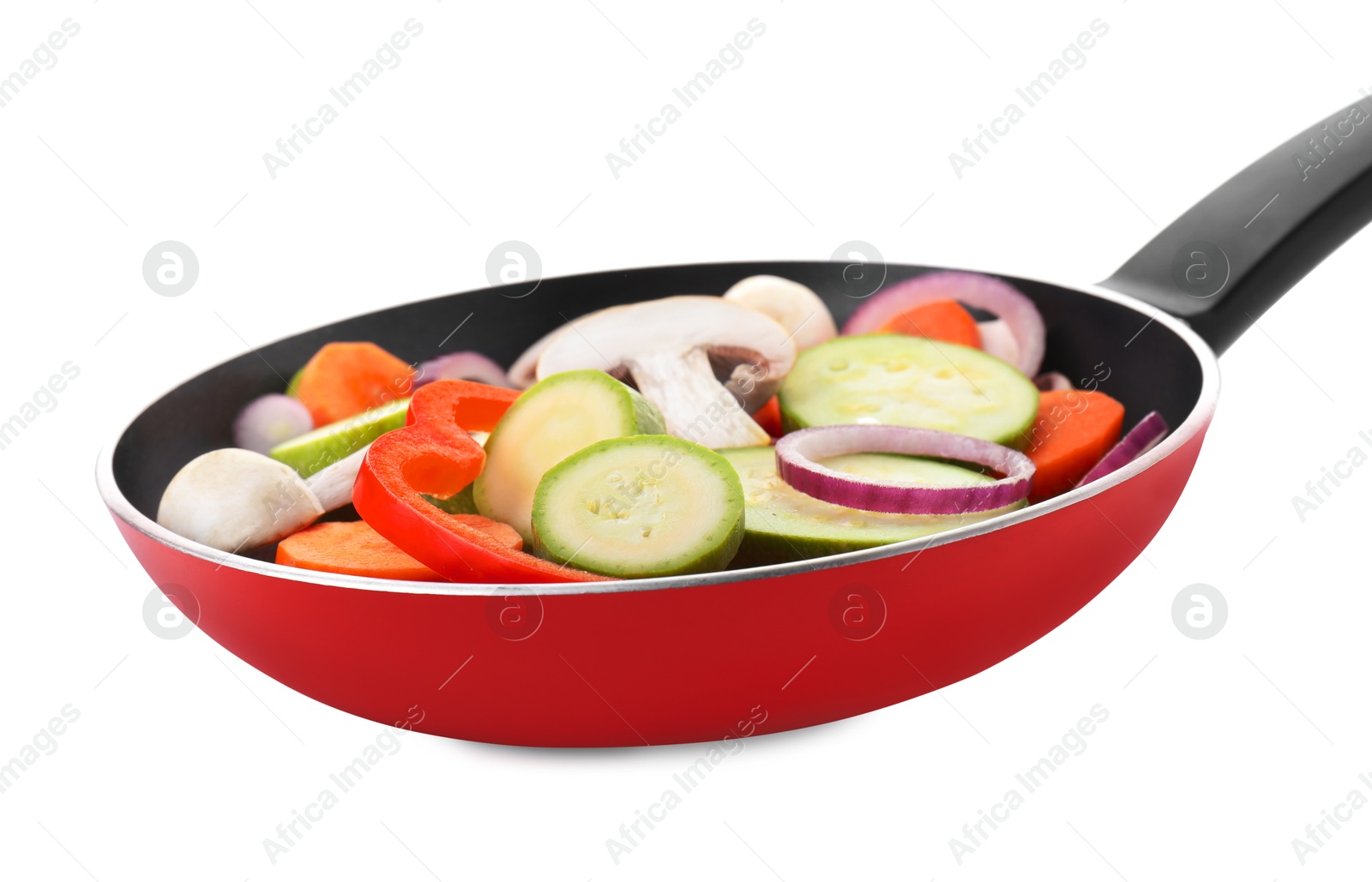 Photo of Frying pan with mix of fresh vegetables and mushrooms isolated on white