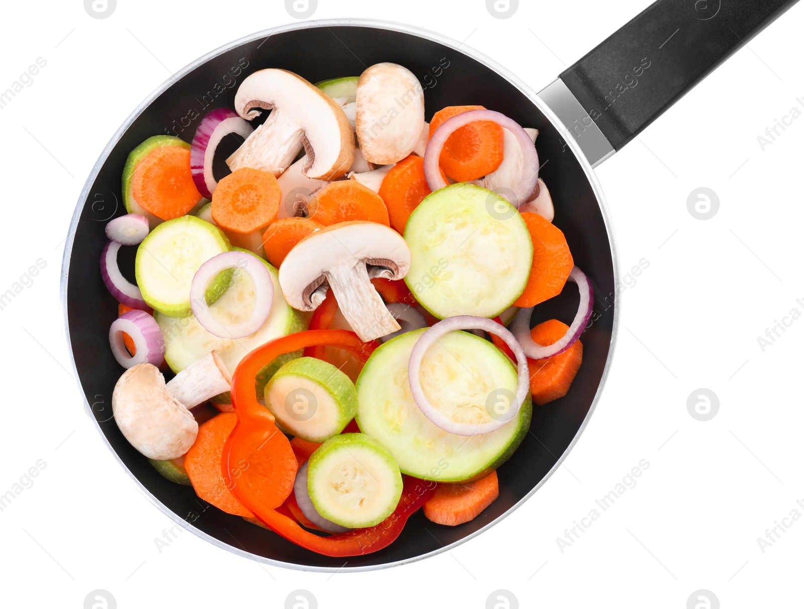 Photo of Frying pan with mix of fresh vegetables and mushrooms isolated on white, top view