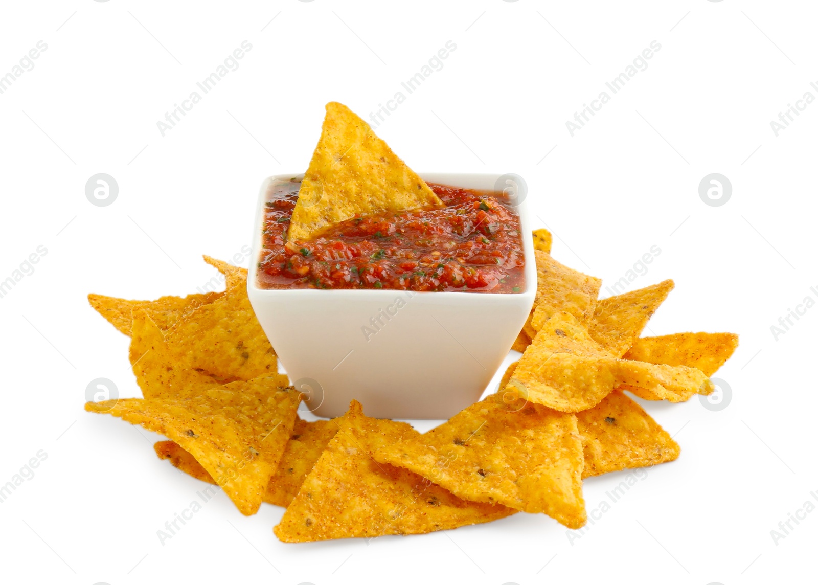 Photo of Tasty salsa sauce in bowl and tortilla chips isolated on white