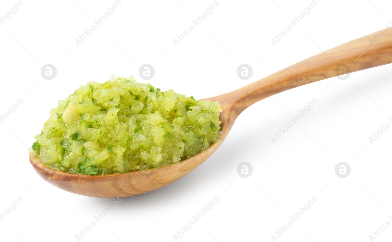 Photo of Delicious homemade green salsa in spoon isolated on white