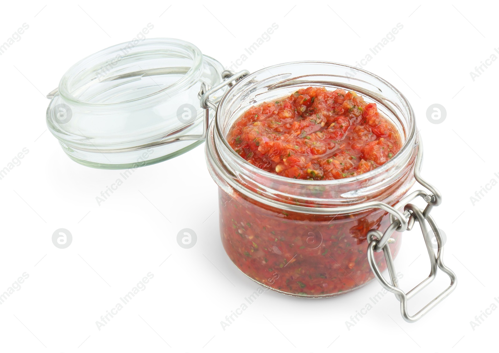 Photo of Delicious homemade red salsa in jar isolated on white