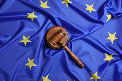 Photo of Judge's gavel on flag of European Union, top view