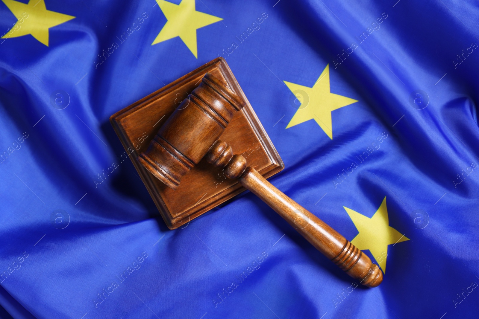 Photo of Judge's gavel on flag of European Union, top view