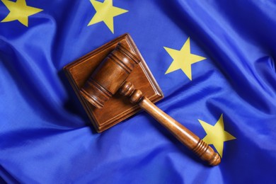 Photo of Judge's gavel on flag of European Union, top view