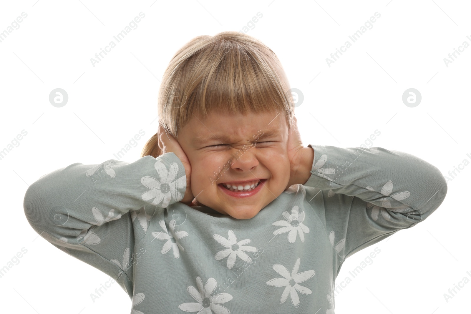 Photo of Little girl covering her ears on white background