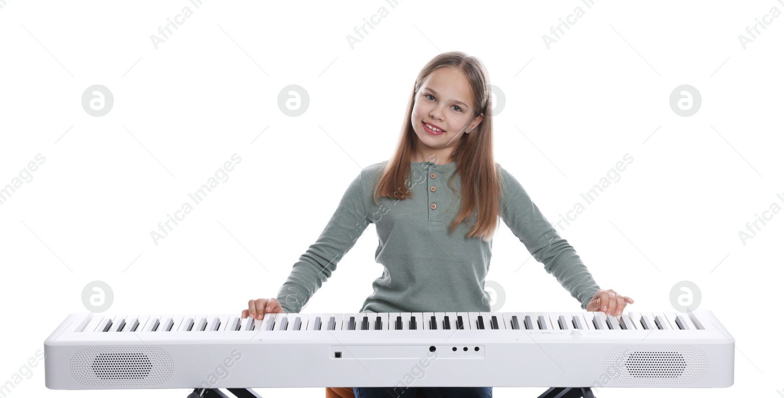 Photo of Cute girl playing synthesizer on white background