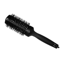 Photo of Hairdresser tool. Round brush isolated on white