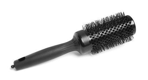 Photo of Hairdresser tool. Round brush isolated on white