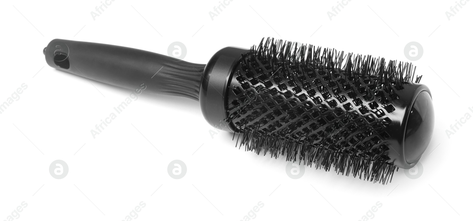 Photo of Hairdresser tool. Round brush isolated on white