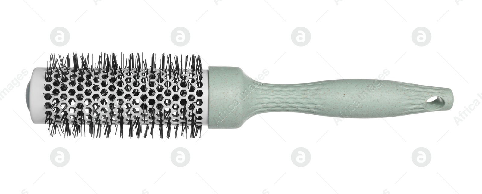 Photo of Hairdresser tool. Round brush isolated on white