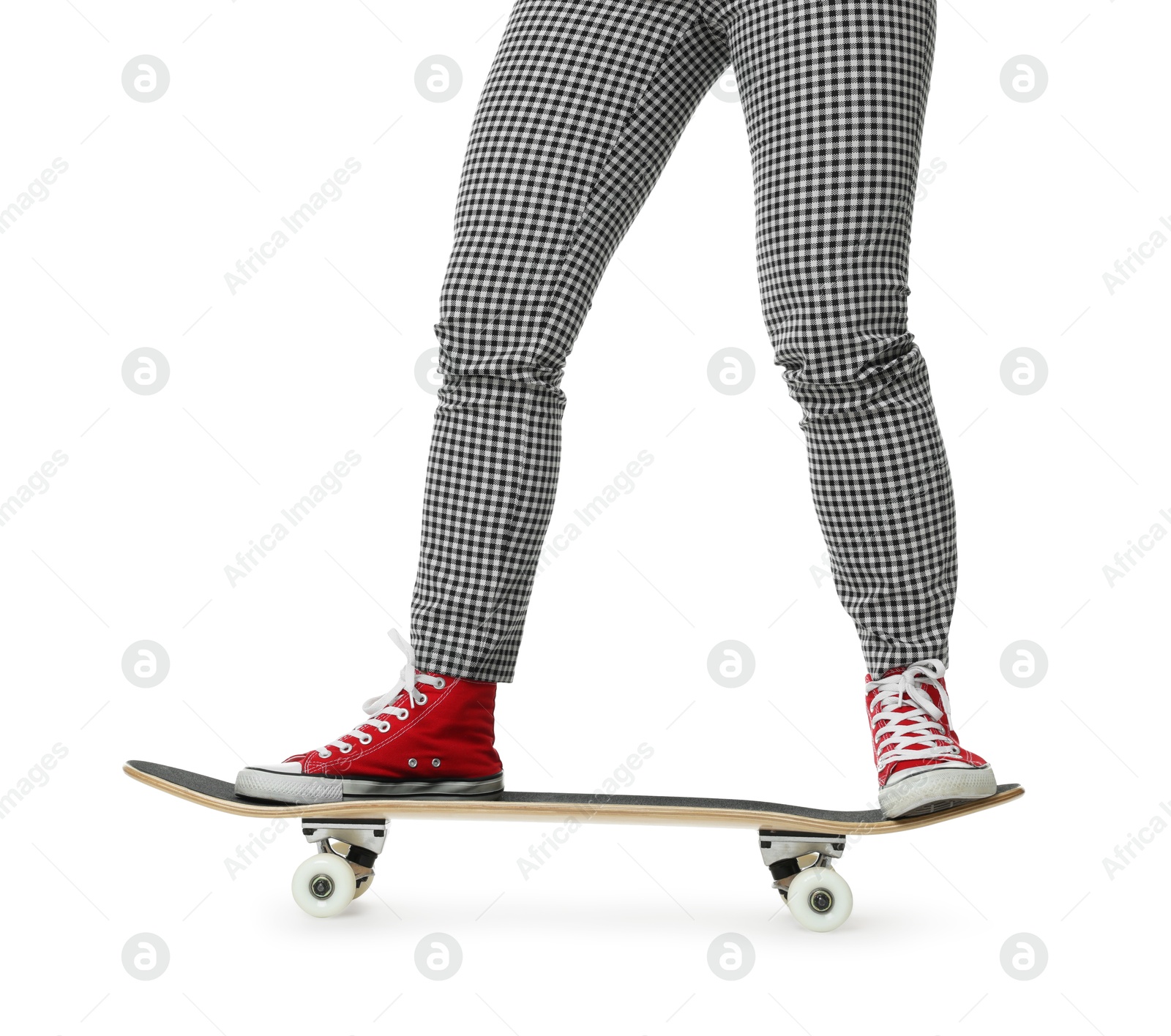 Photo of Woman riding skateboard on white background, closeup