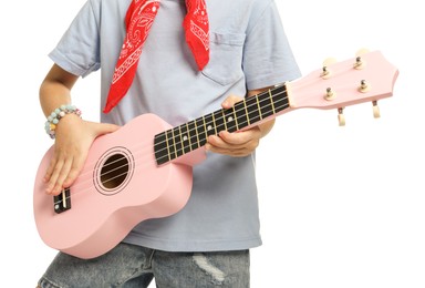 Photo of Little girl playing ukulele on white background, closeup