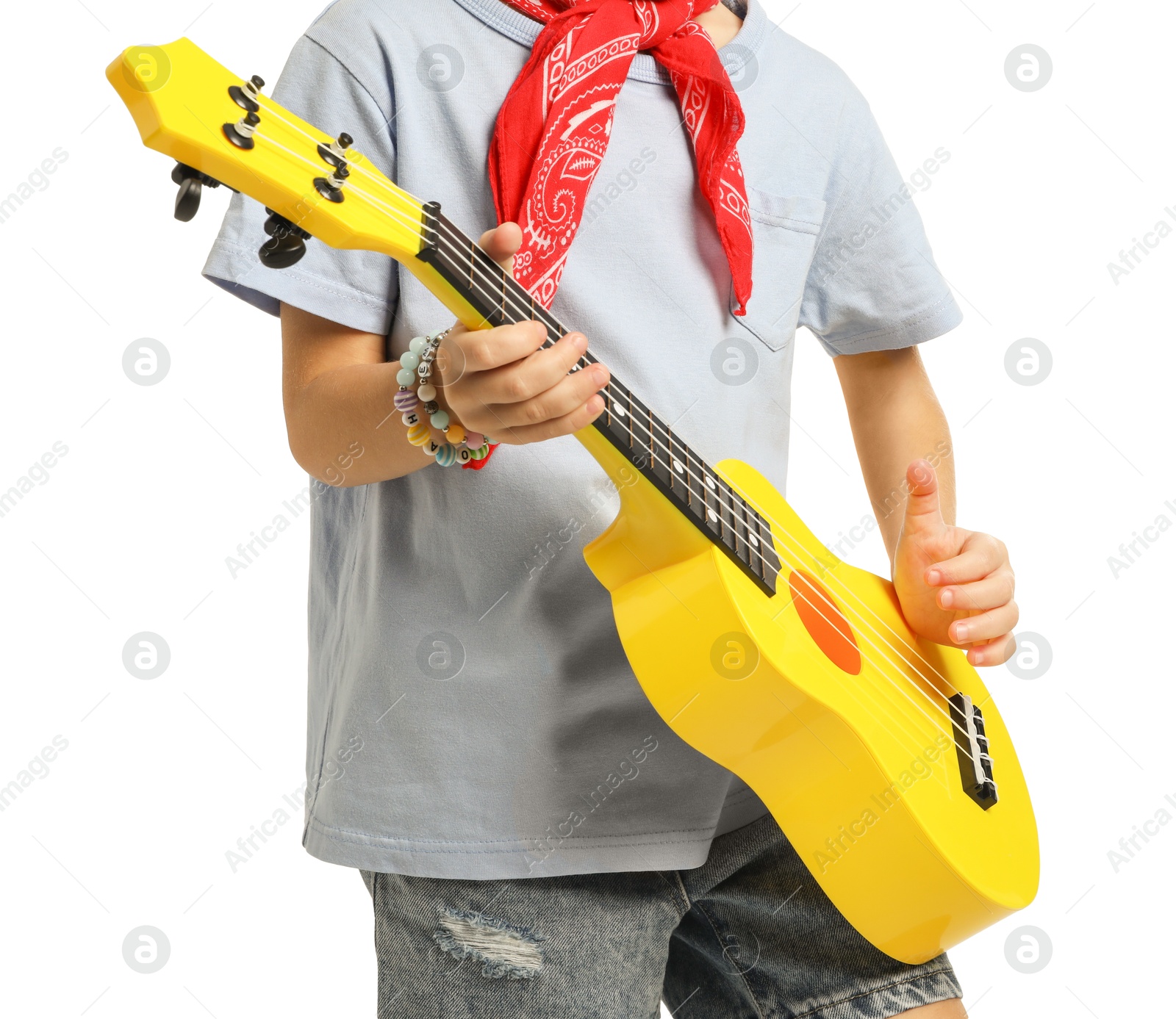 Photo of Little girl playing ukulele on white background, closeup