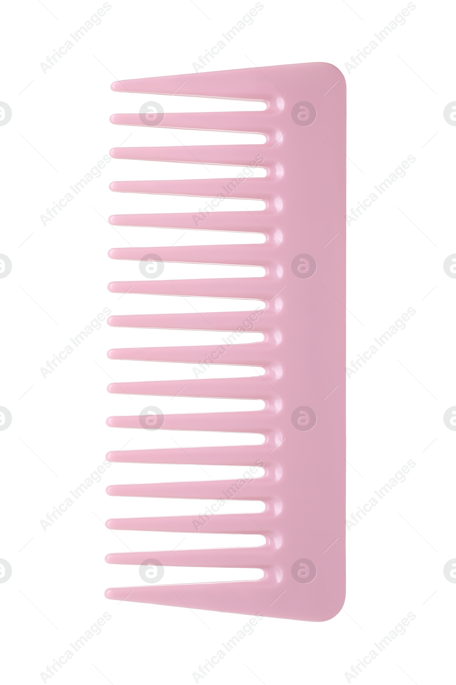 Photo of One pink plastic comb isolated on white