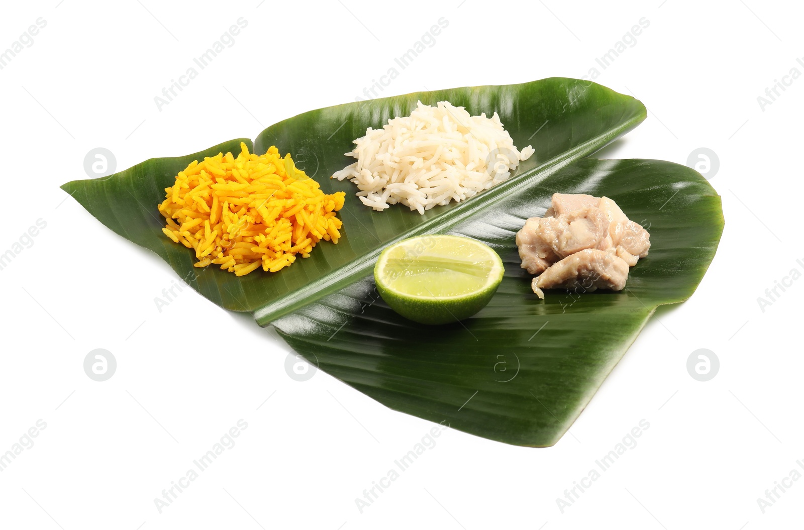 Photo of Cut banana leaf with different food isolated on white. Healthy eco serving