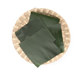 Photo of Pieces of banana leaves isolated on white, top view. Traditional meal serving