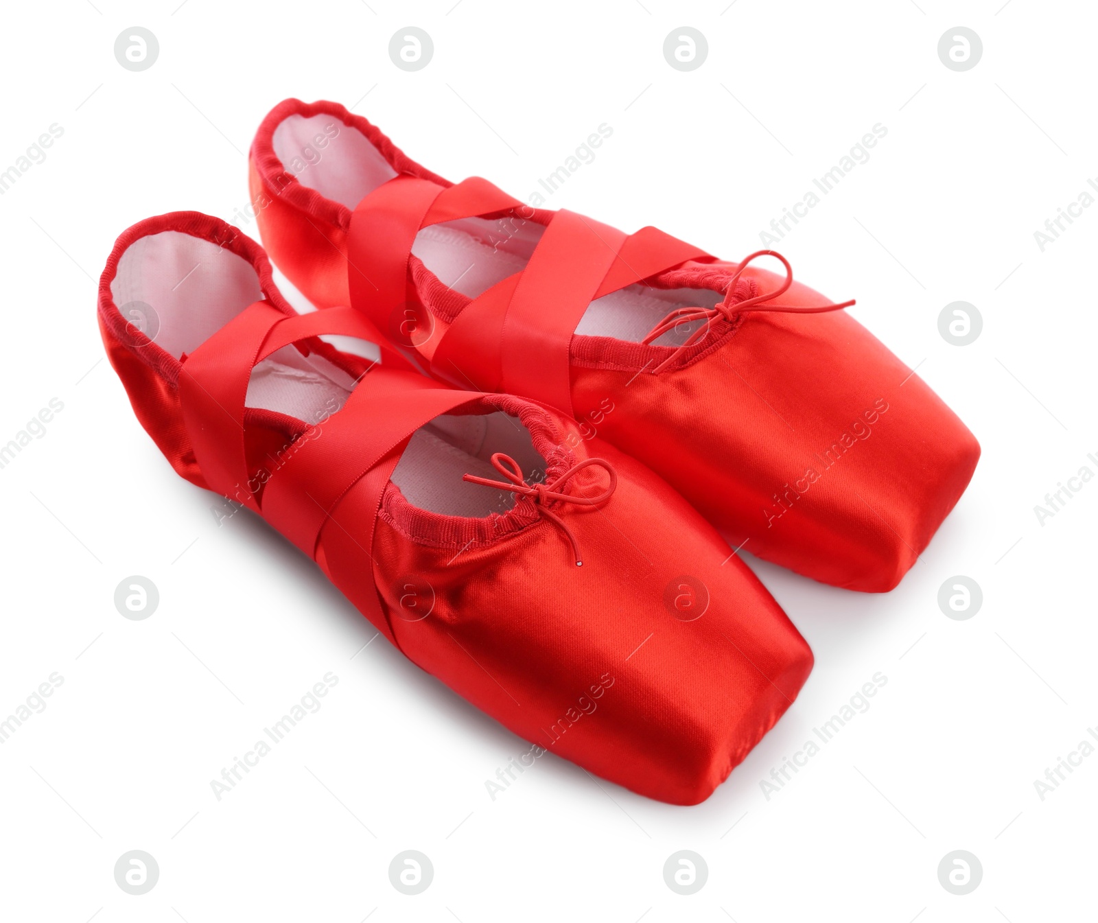 Photo of Pair of beautiful red pointe shoes isolated on white