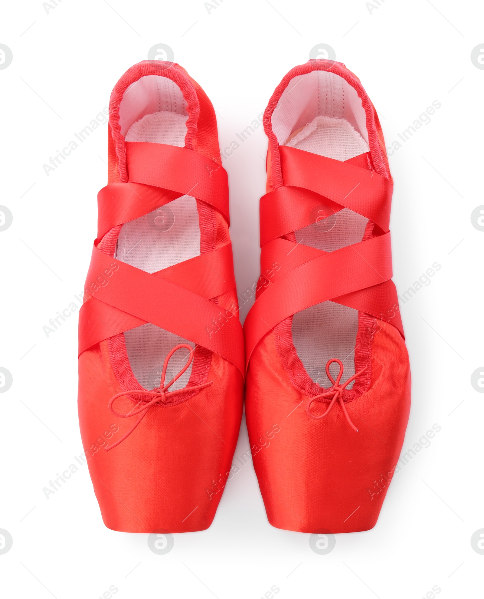 Photo of Pair of beautiful red pointe shoes isolated on white