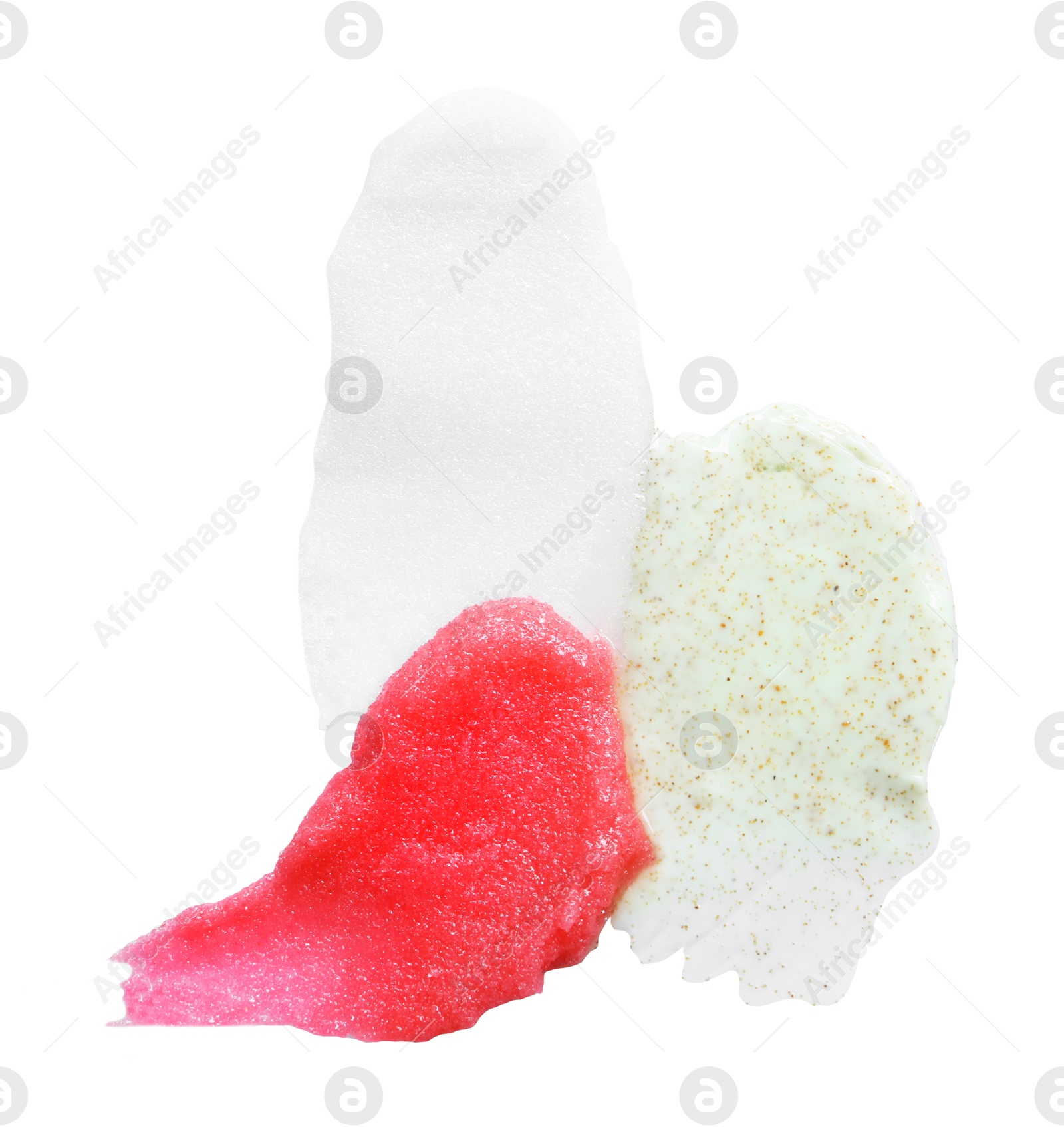 Photo of Smears of different body scrubs isolated on white, top view