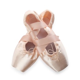 Photo of Pair of beautiful beige pointe shoes isolated on white, top view