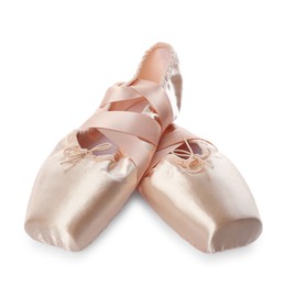 Photo of Pair of beautiful beige pointe shoes isolated on white