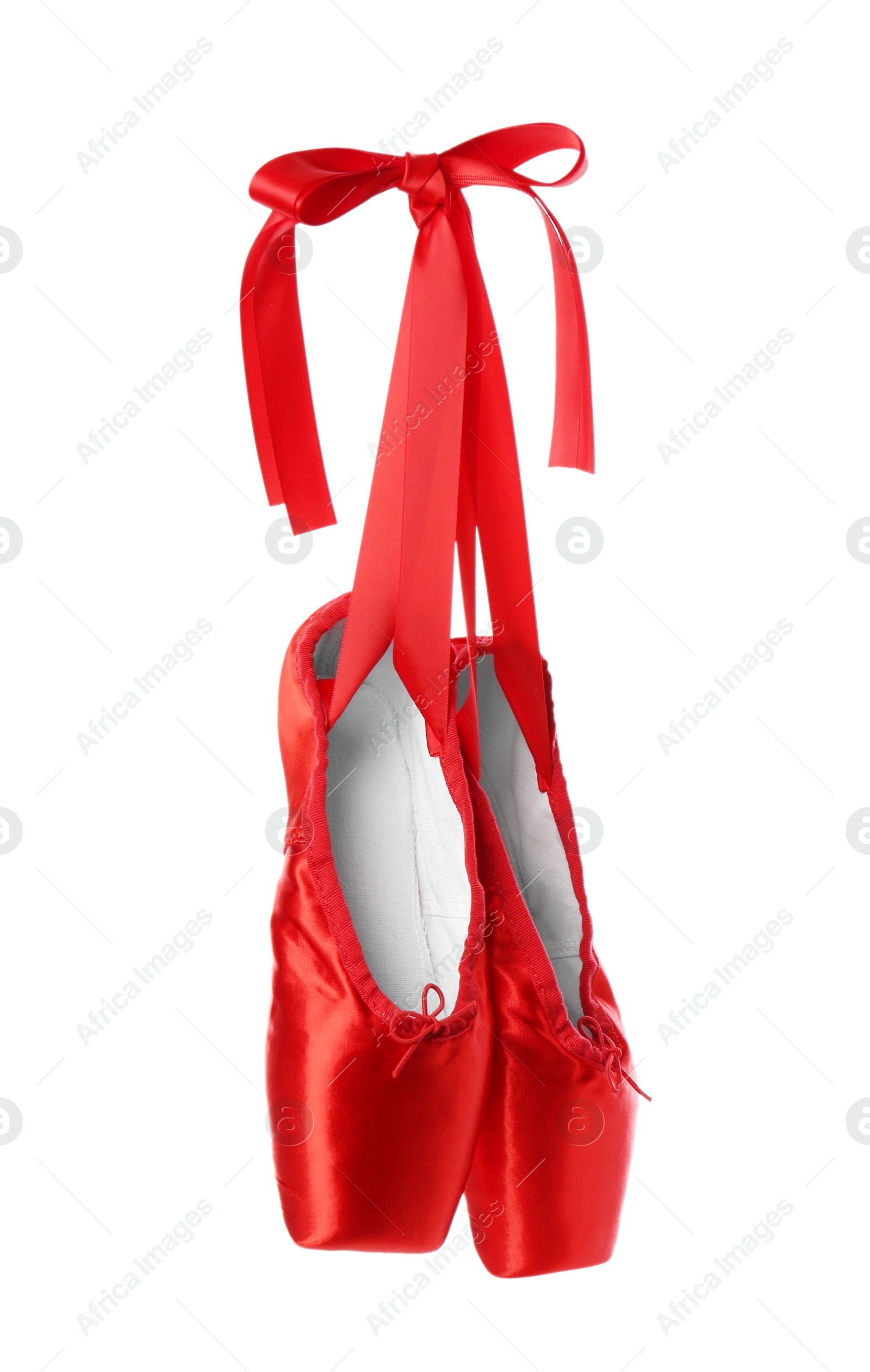 Photo of Pair of beautiful red pointe shoes isolated on white