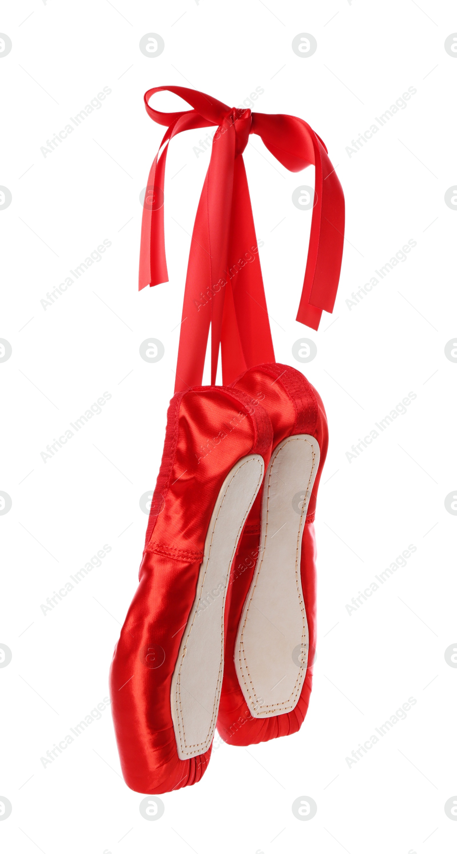 Photo of Pair of beautiful red pointe shoes isolated on white