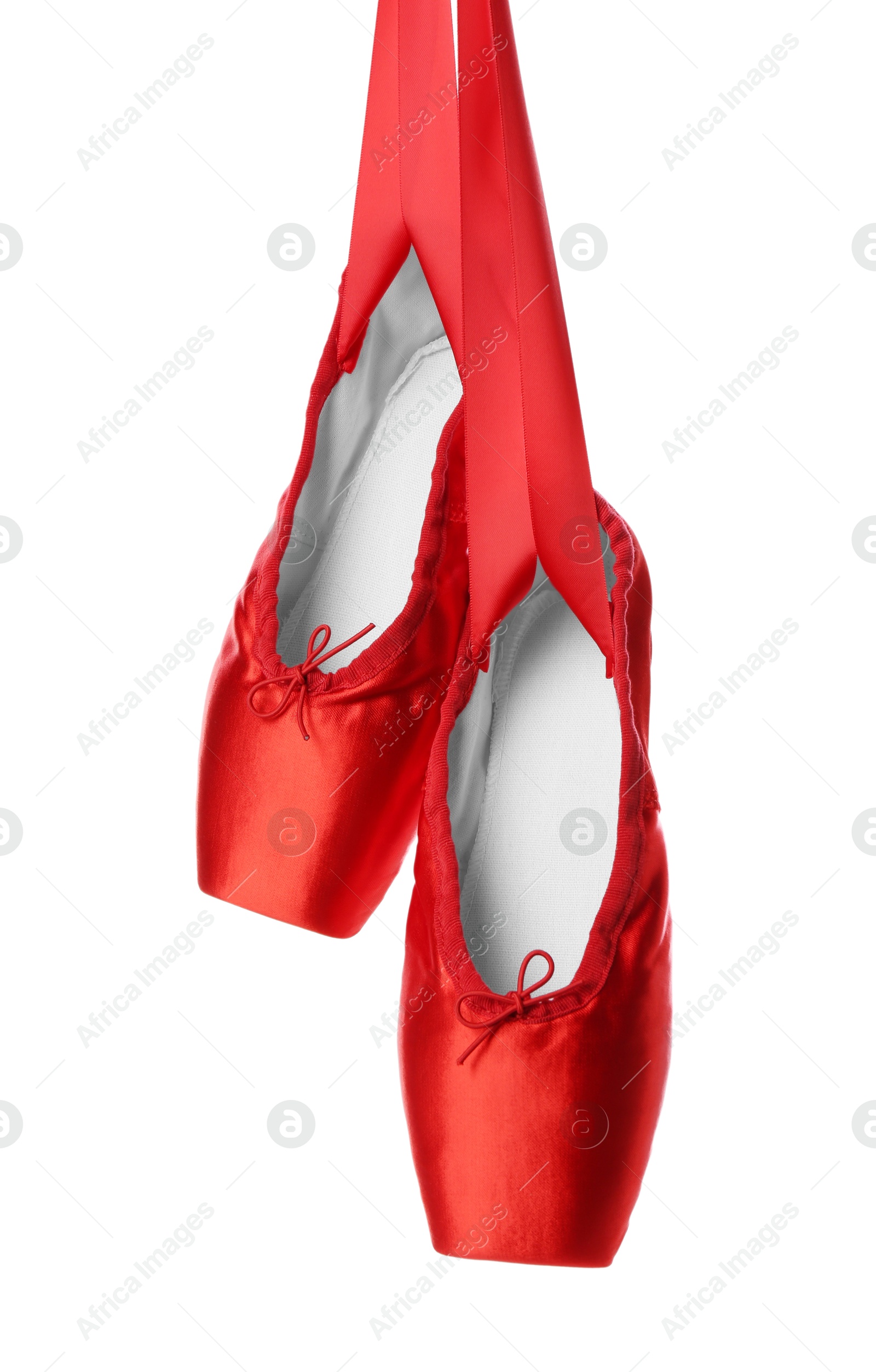 Photo of Pair of beautiful red pointe shoes isolated on white