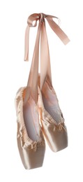 Photo of Pair of beautiful beige pointe shoes isolated on white