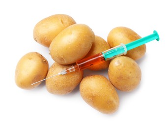 Photo of GMO concept. Potatoes and syringe isolated on white, top view