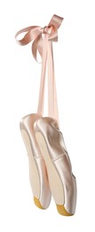 Photo of Pair of beautiful pointe shoes in air isolated on white