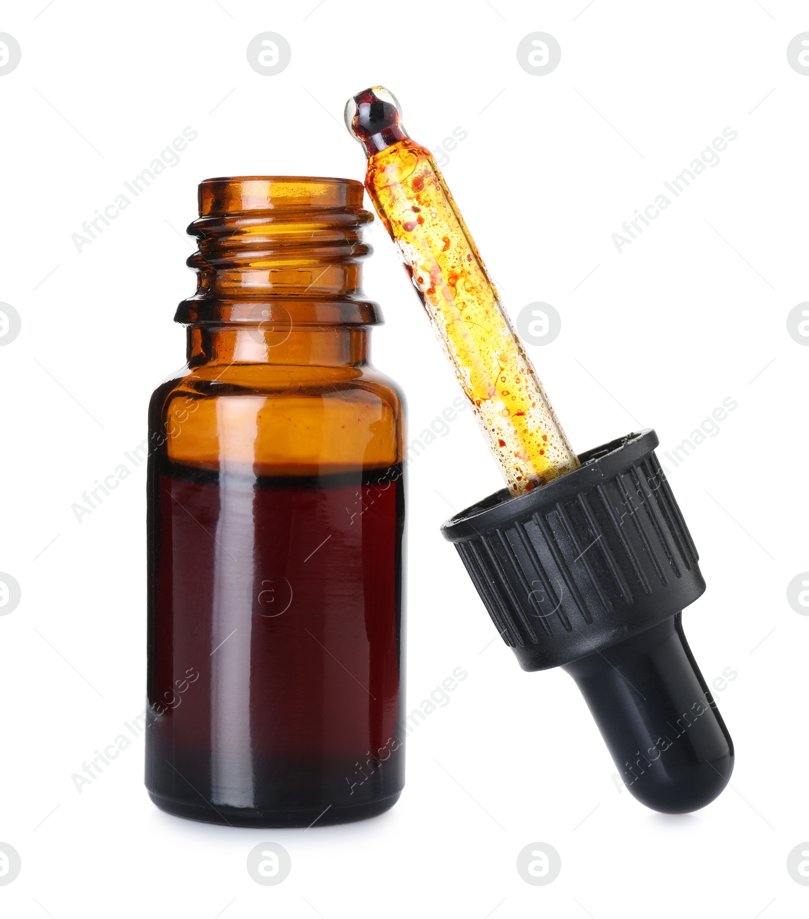 Photo of Bottle of topical iodine with pipette isolated on white