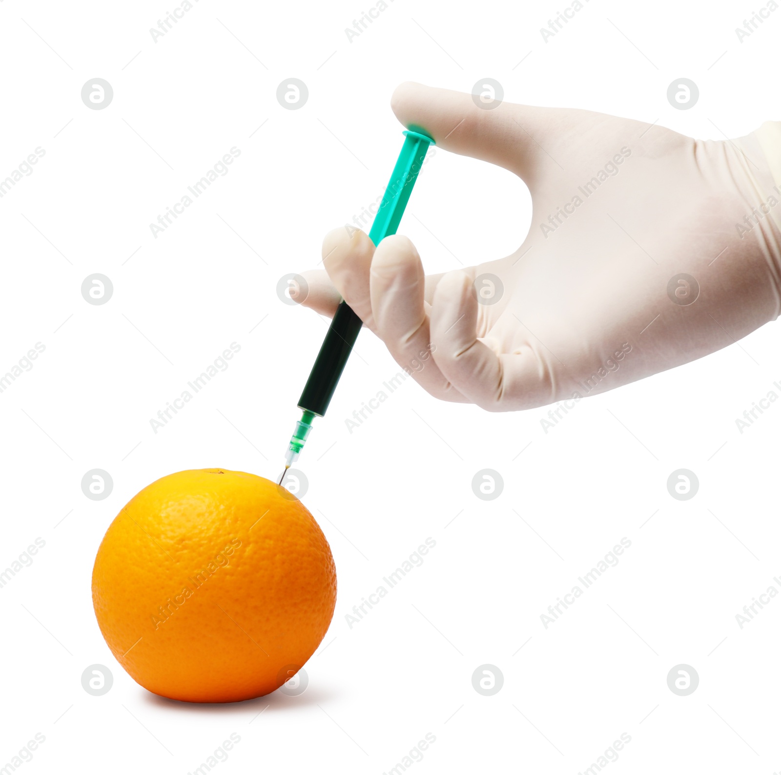 Photo of GMO concept. Scientist injecting something into fresh orange against white background, closeup