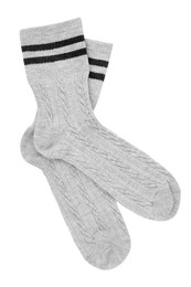 Photo of Pair of soft socks isolated on white, top view