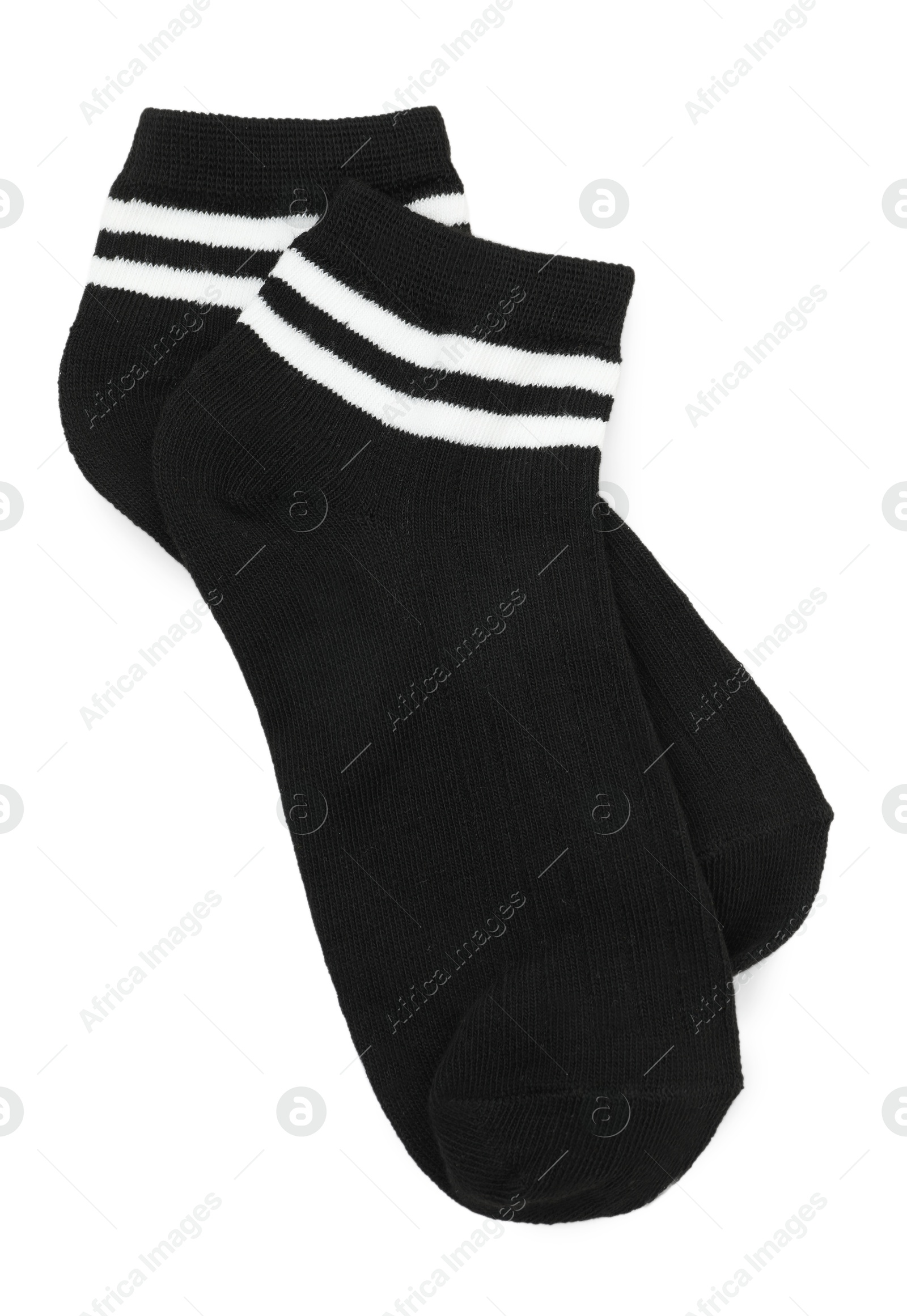 Photo of Pair of soft socks isolated on white, top view