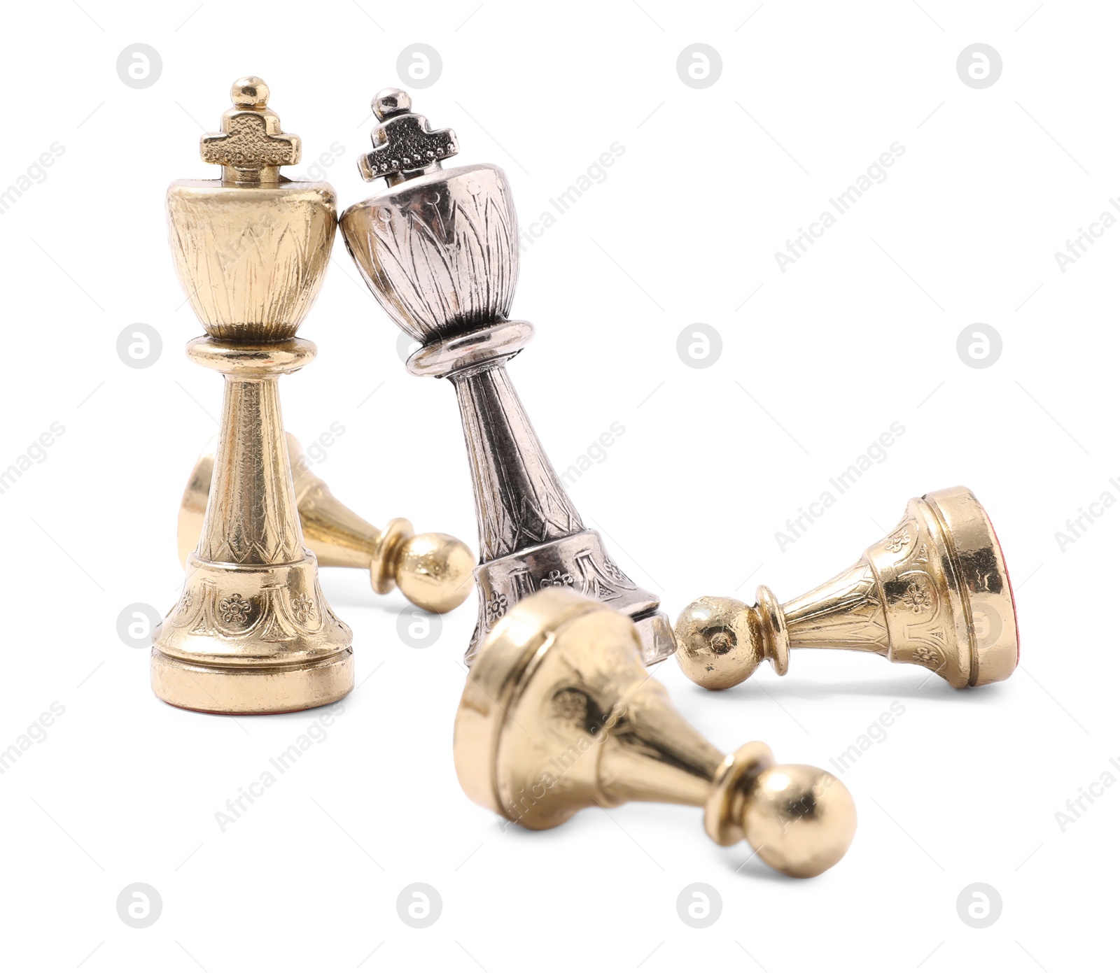 Photo of Golden and silver chess kings near fallen pawns on white background. Competition concept