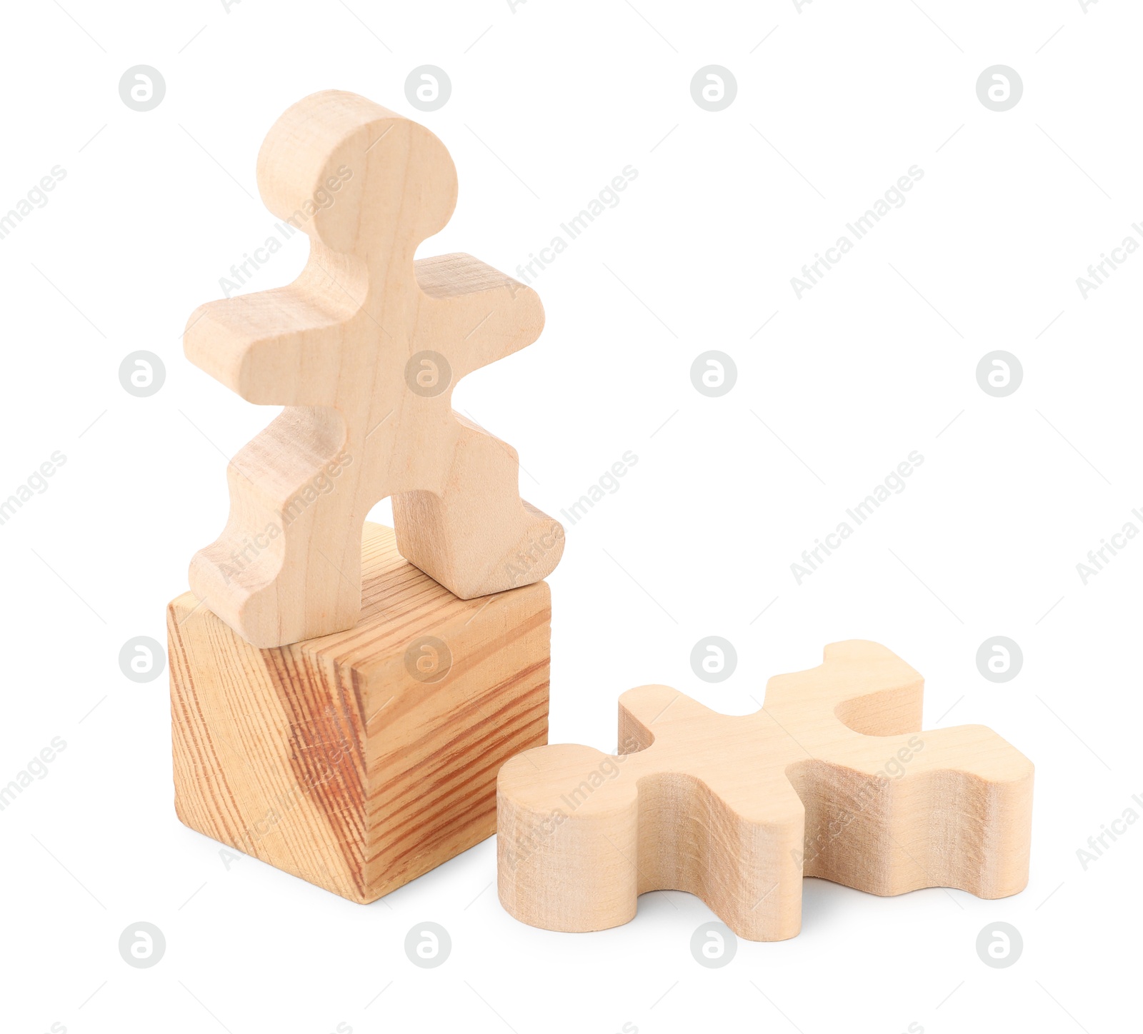 Photo of Human figure on wooden block near fallen one against white background. Competition concept