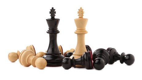 Photo of Chess kings among fallen pawns on white background. Competition concept